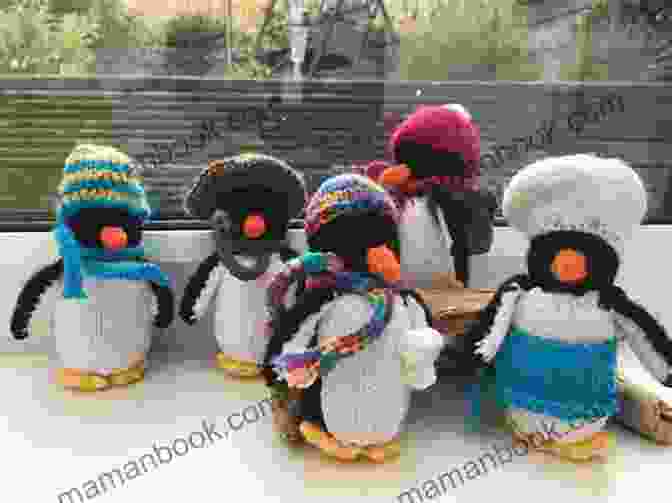 A Knitted Penguin Wearing A Scarf And Hat Knit Penguin Pattern